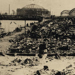 Ruins of Honjo, showing the Kokugikan Sumo Stadium and Ryōgoku Bridge<br>Source: 大正大震大火之記念, 1923