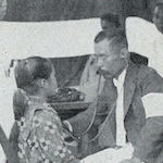 靖國神社境內警視廳救護所  九月二十日<br>Children receiving medical treatment at a first aid station in the grounds of Yasukuni Shrine, 20 September 1923 (run by the Metropolitan Police Department)<br>Source: 大正大震災誌  警示廳, 1925