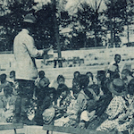 日比谷公園の少国民学校<br>Children attend open-air classes in Hibiya Park<br>Source: Postcard